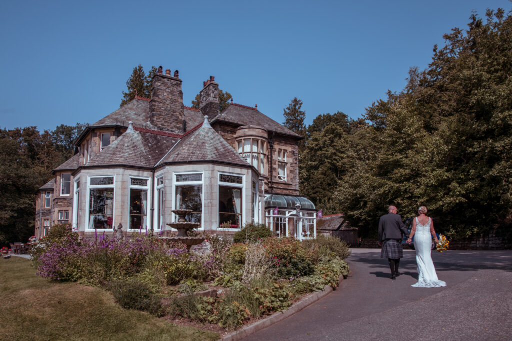 couple walking into wedding