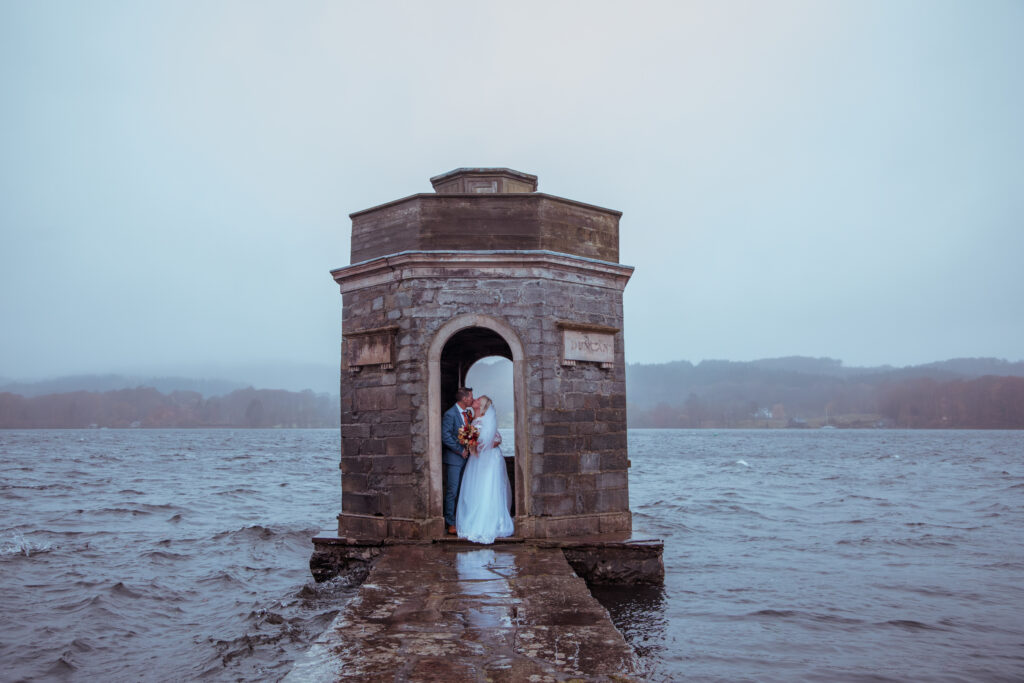 bride and groom on a rainy day