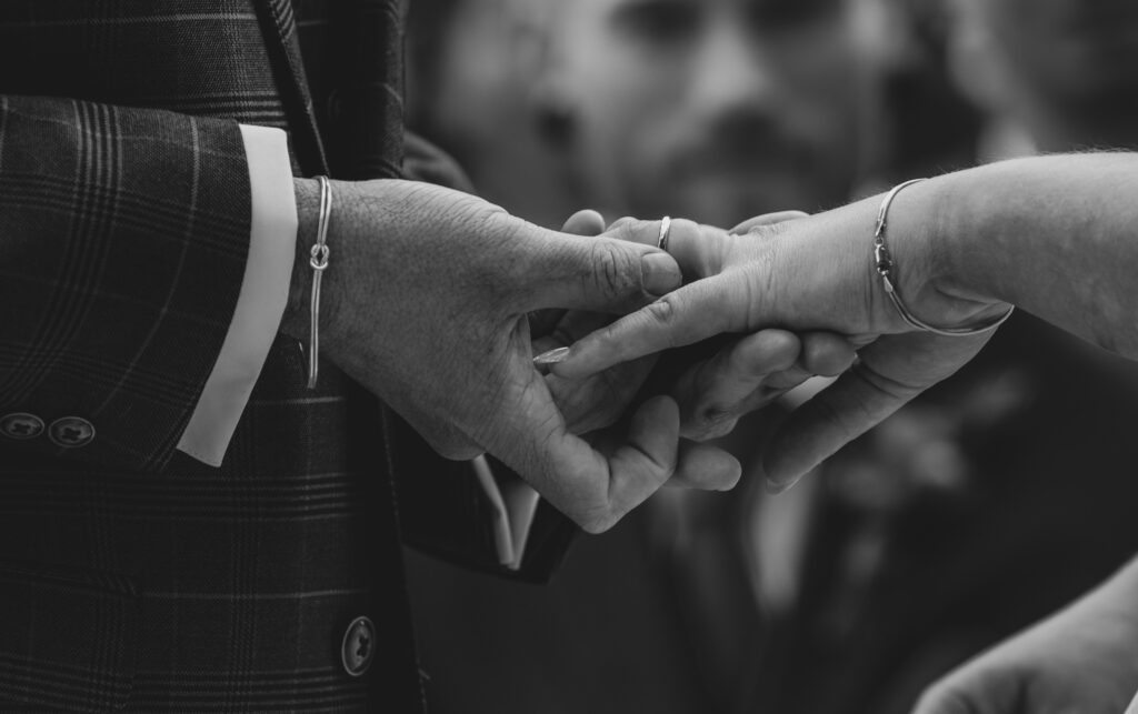 wedding ring going on finger