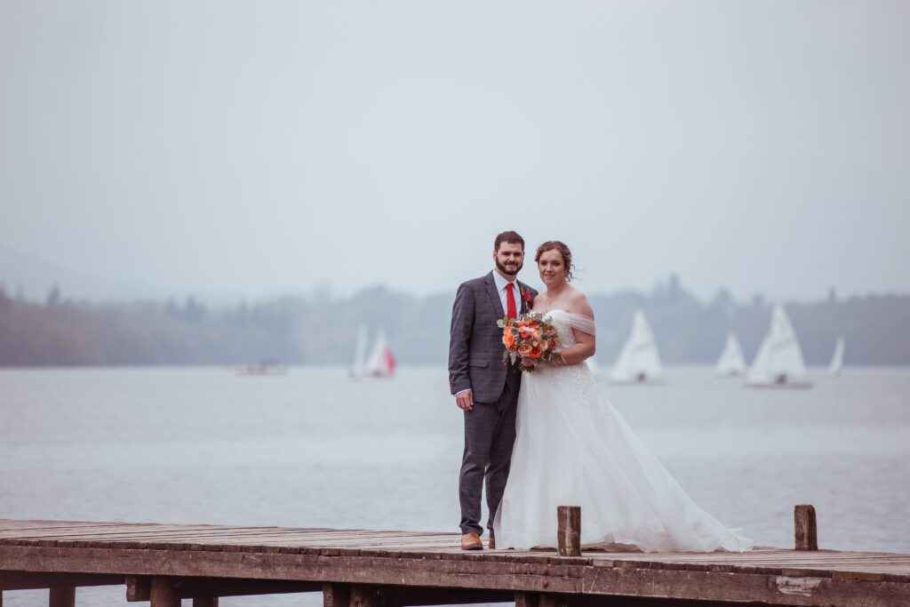 couple on windermere jetty post wedding