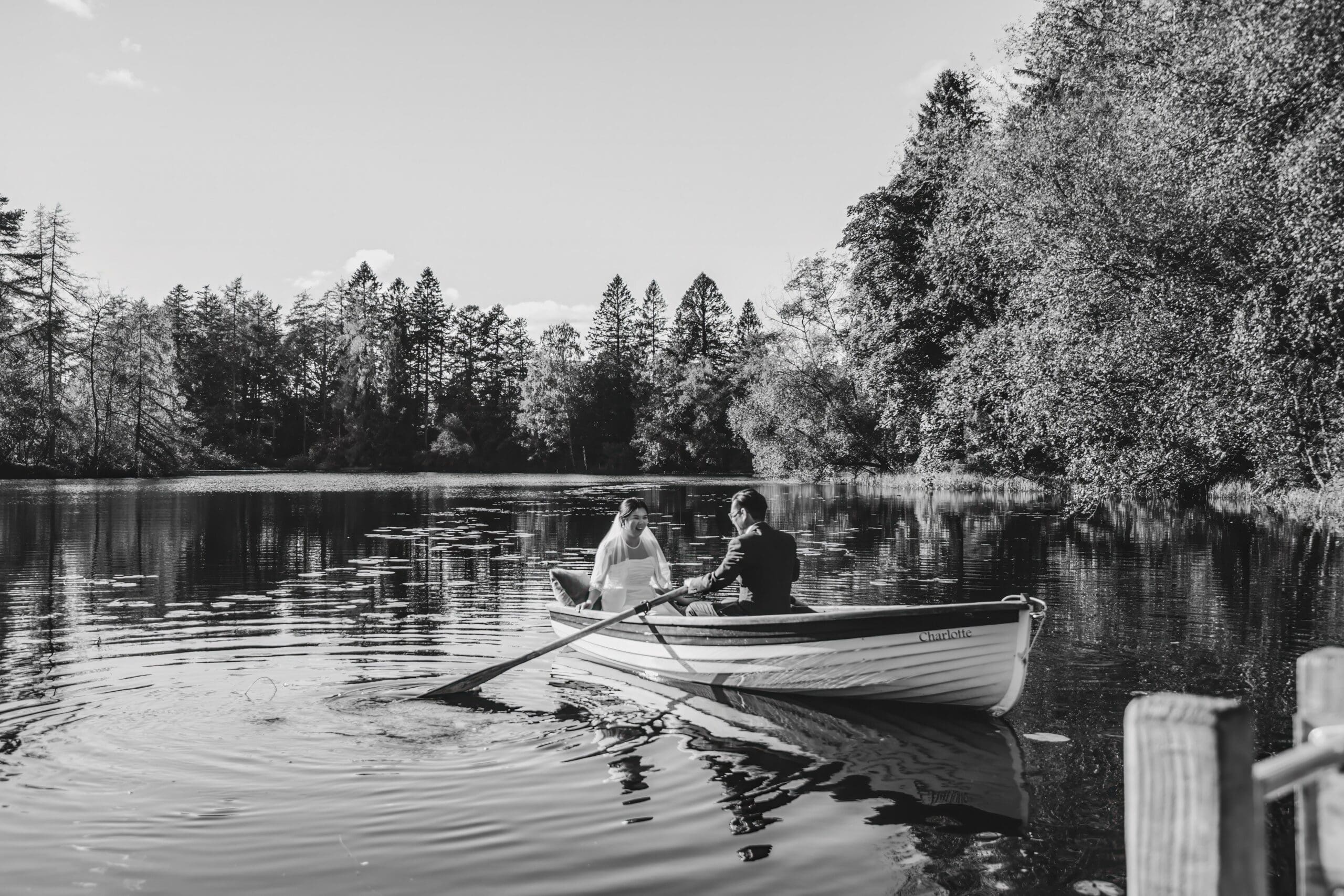 married couple on boat at gilpin lake house