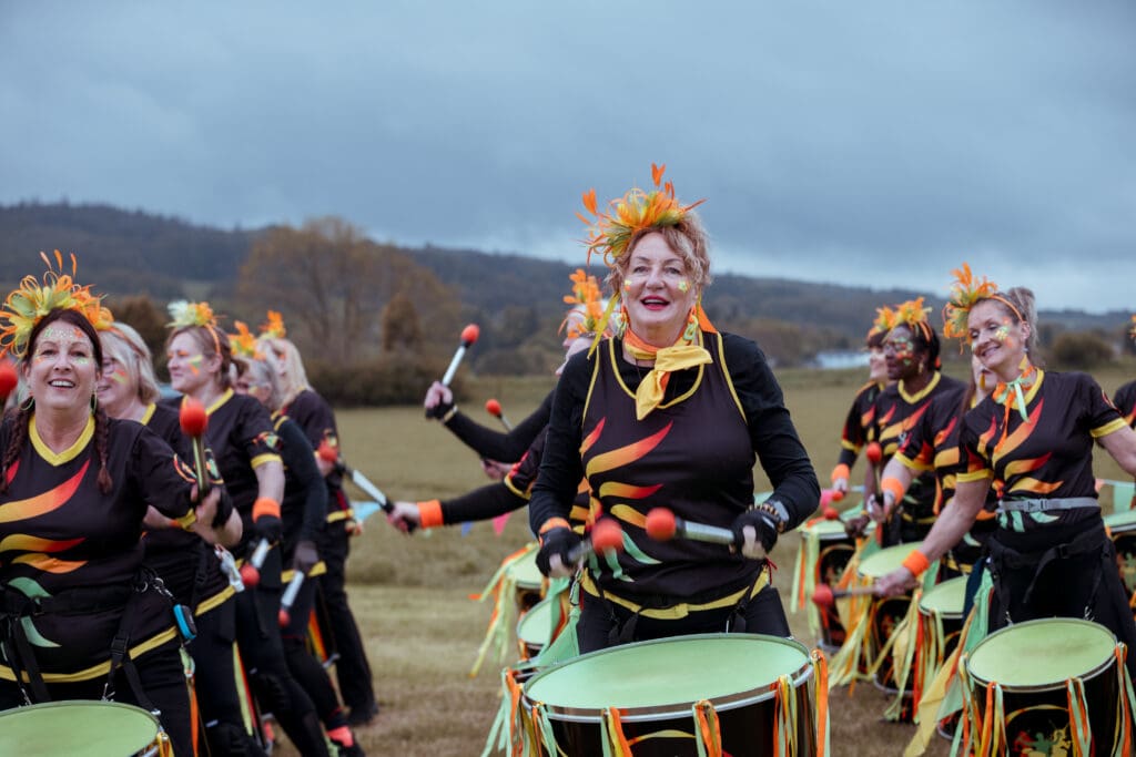 samba artists playing in field during wedding